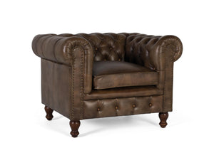 Poltrona Chester realizzata in pelle con finitura capitonné