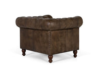 Poltrona Chester realizzata in pelle con finitura capitonné