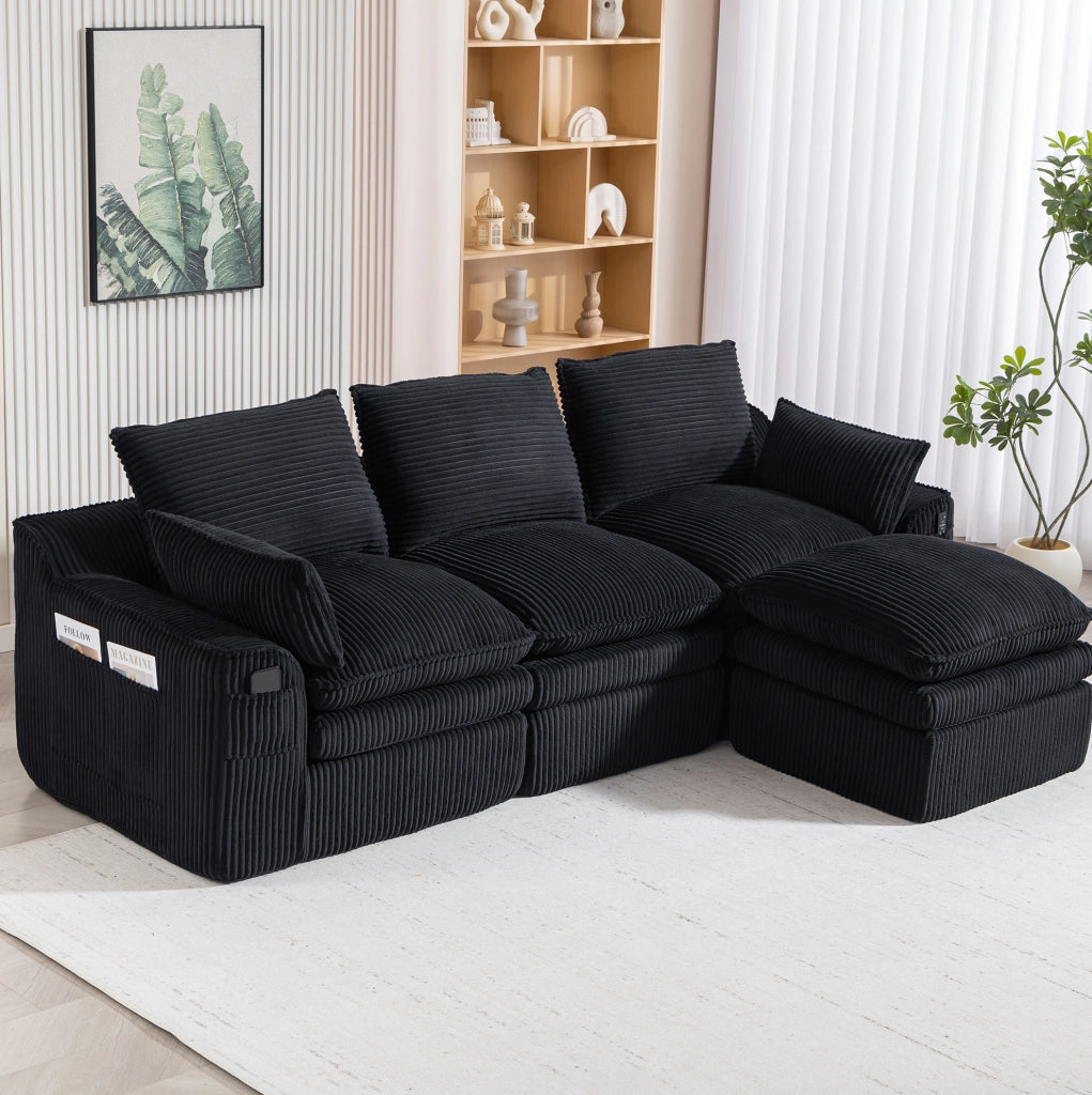 Divano modulare in velluto a coste nero con pouf e tasche laterali