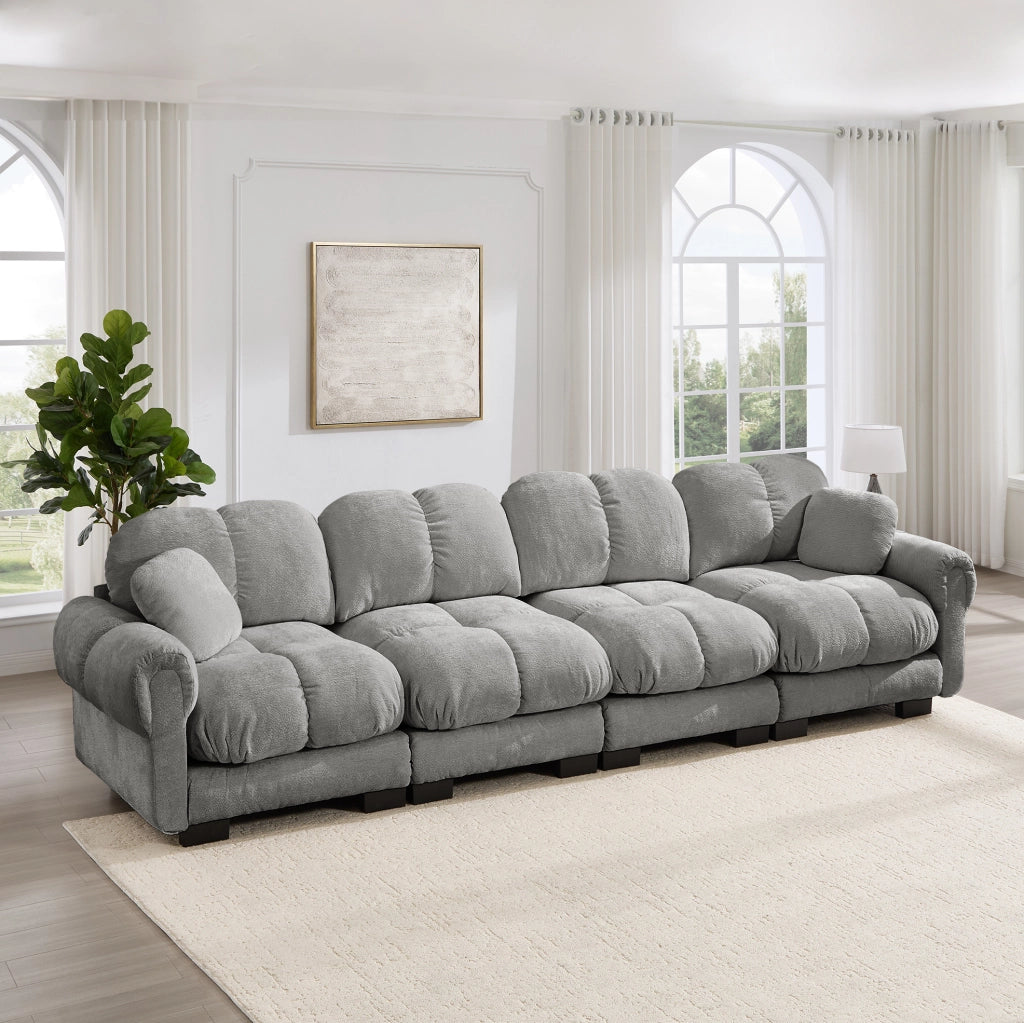 Divano modulare in chenille con cuciture trapuntate e cuscino mobile 330x86x90 cm; grigio chiaro