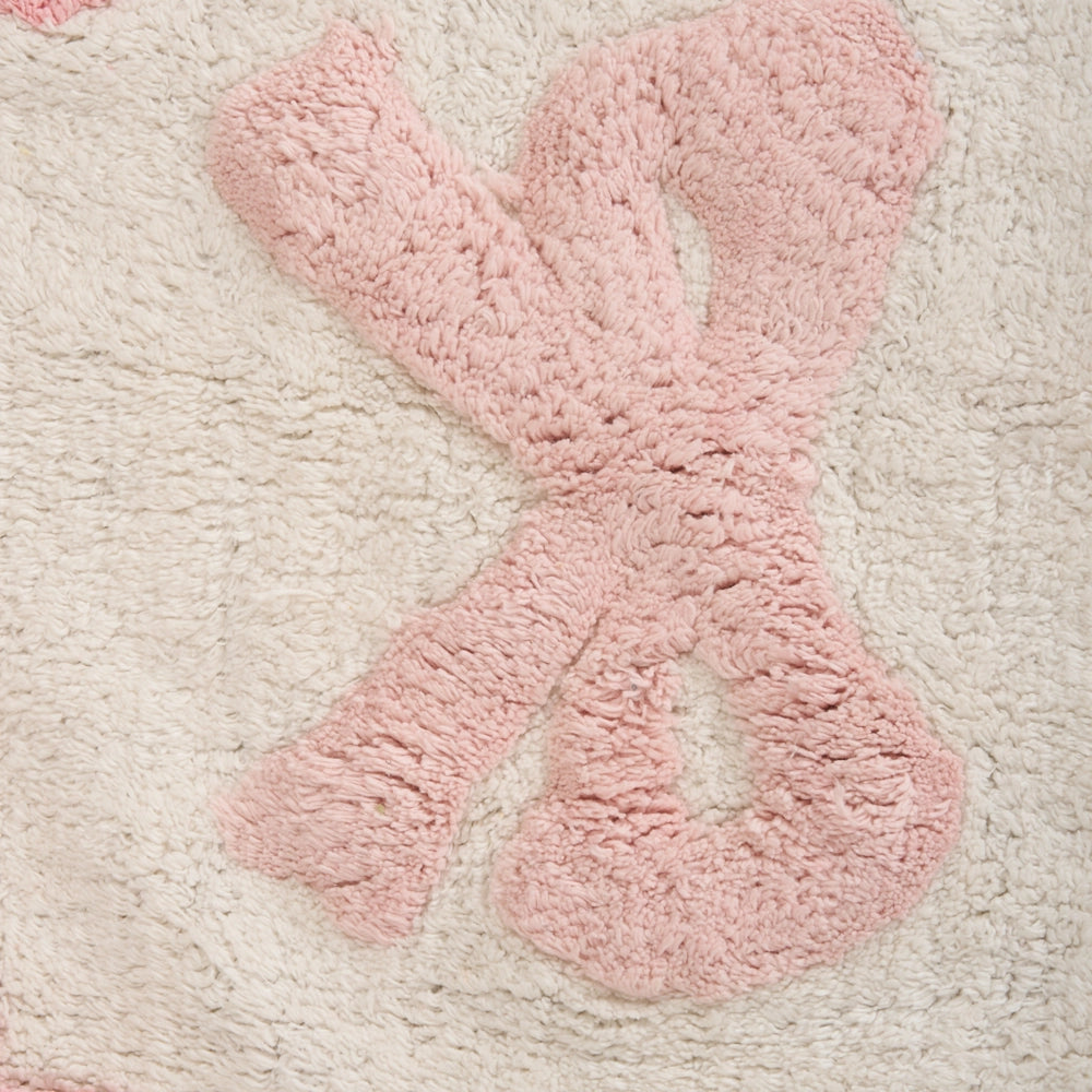 Tappeto per bambini rettangolare taftato in cotone bianco e rosa 90 x 130 cm con nastri decorativi