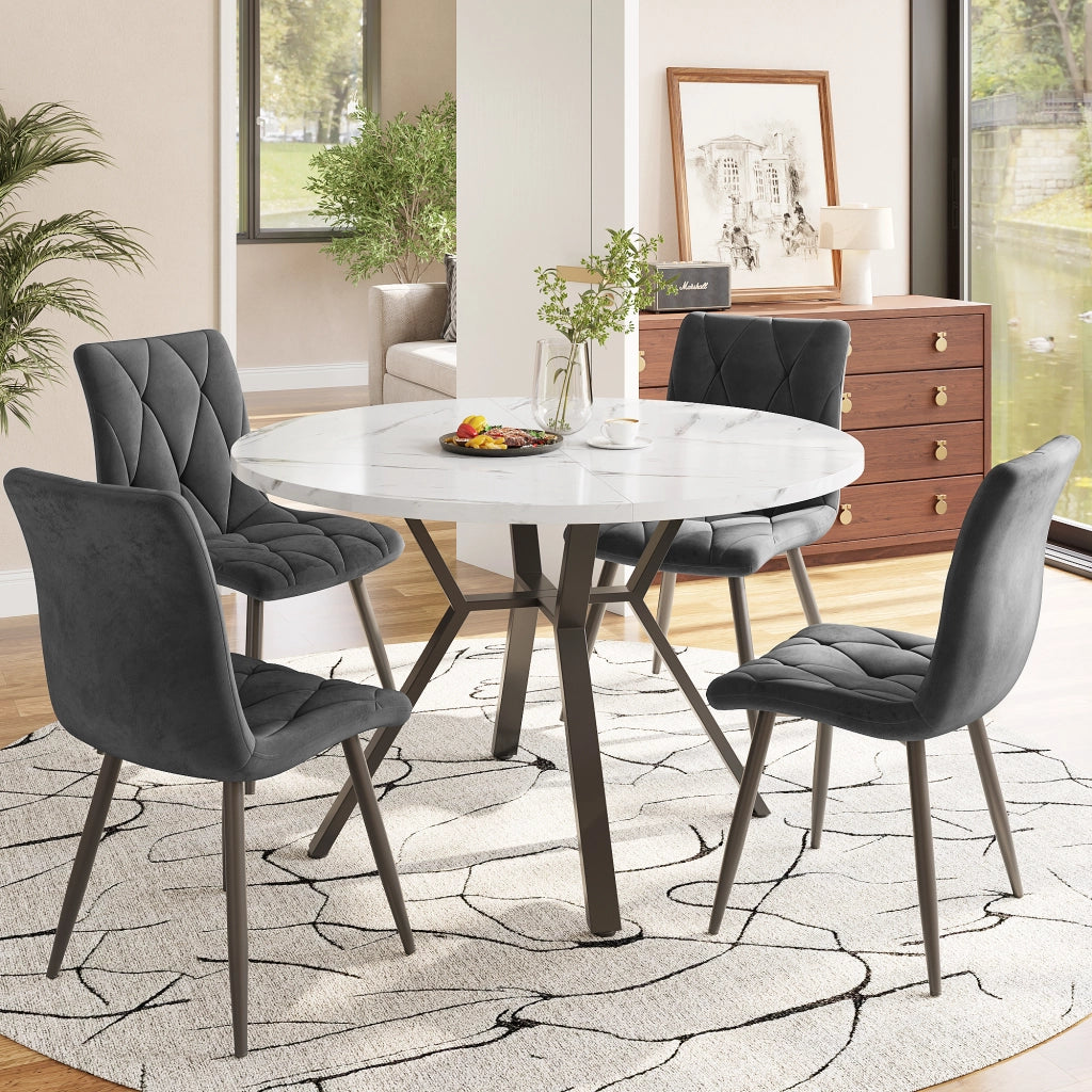 Tavolo da pranzo per 4 persone con piano rotondo effetto marmo, gambe in metallo nero e 4 sedie ergonomiche