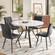 Tavolo da pranzo per 4 persone con piano rotondo effetto marmo, gambe in metallo nero e 4 sedie ergonomiche