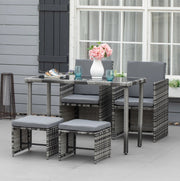 Salottino 5 pezzi in polyrattan grigio con cuscini e tavolo con piano in vetro