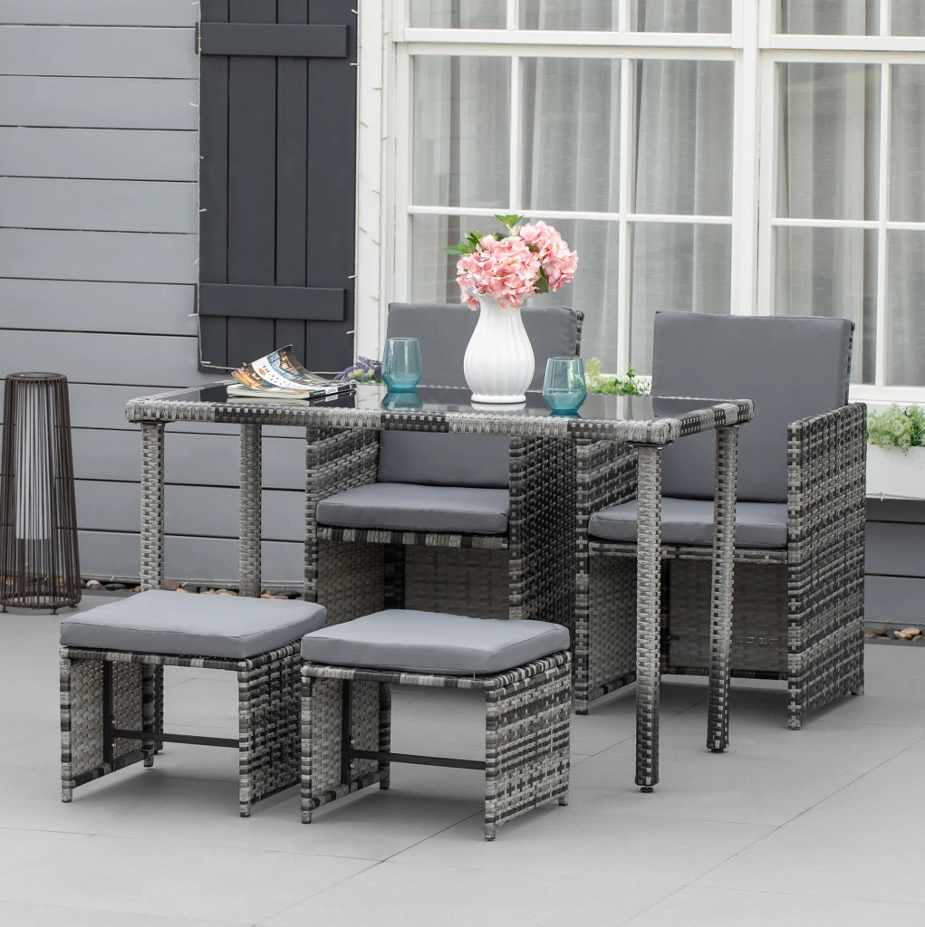 Salottino 5 pezzi in polyrattan grigio con cuscini e tavolo con piano in vetro