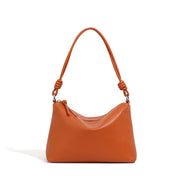 Borsa a tracolla da donna in vera pelle, colore marrone.