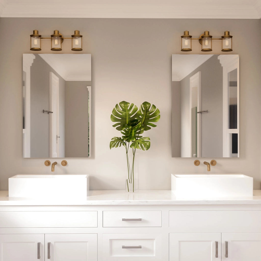 Applique bagno ottone anticato Riggs 3xE27 IP44 Quoizel