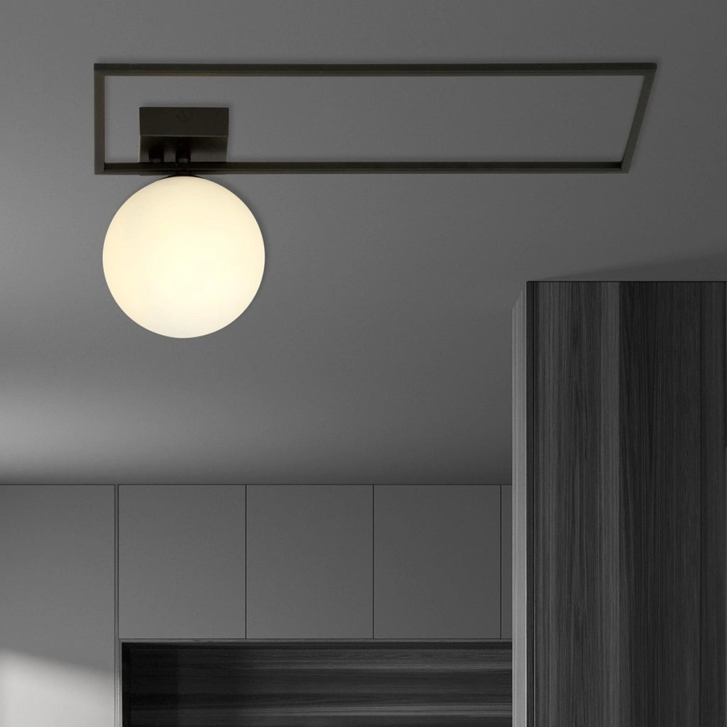 Lampada a parete IMAGO in acciaio nero opaco e vetro opale