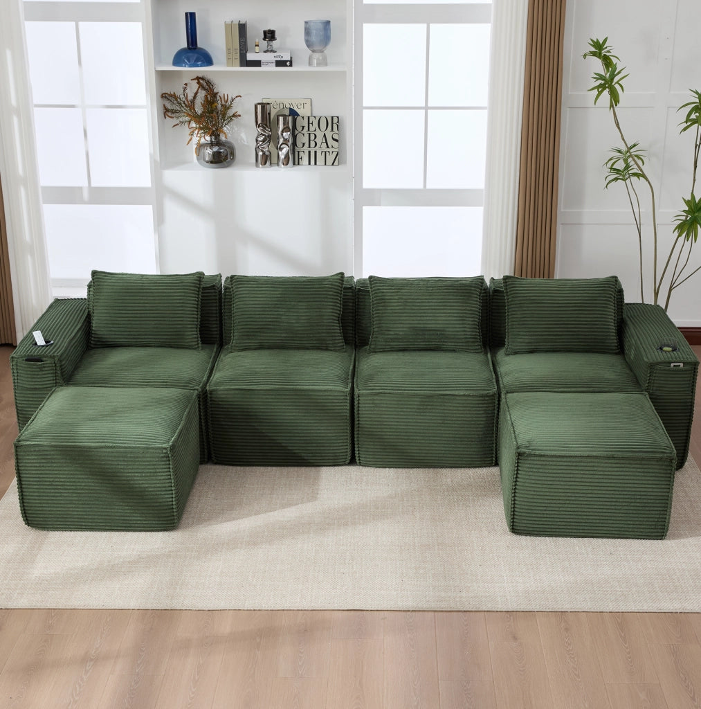 Divano modulare in velluto a coste verde con portabevande