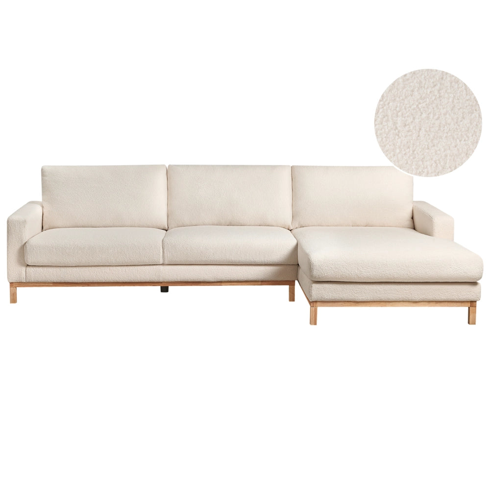 Divano angolare sinistro Rivestimento in bouclé bianco Gambe in legno Elegante