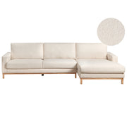 Divano angolare sinistro Rivestimento in bouclé bianco Gambe in legno Elegante