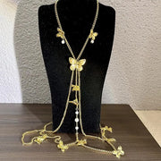 Collana fatta a mano con farfalla, nappa e perle, regalo di Natale o di compleanno.