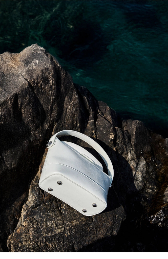 Borsa a mano e borsetta da donna in vera pelle, bianca.