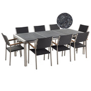 Set da pranzo da giardino Nero con piano in granito fiammato sedie in rattan 8 posti 220 x 100 cm