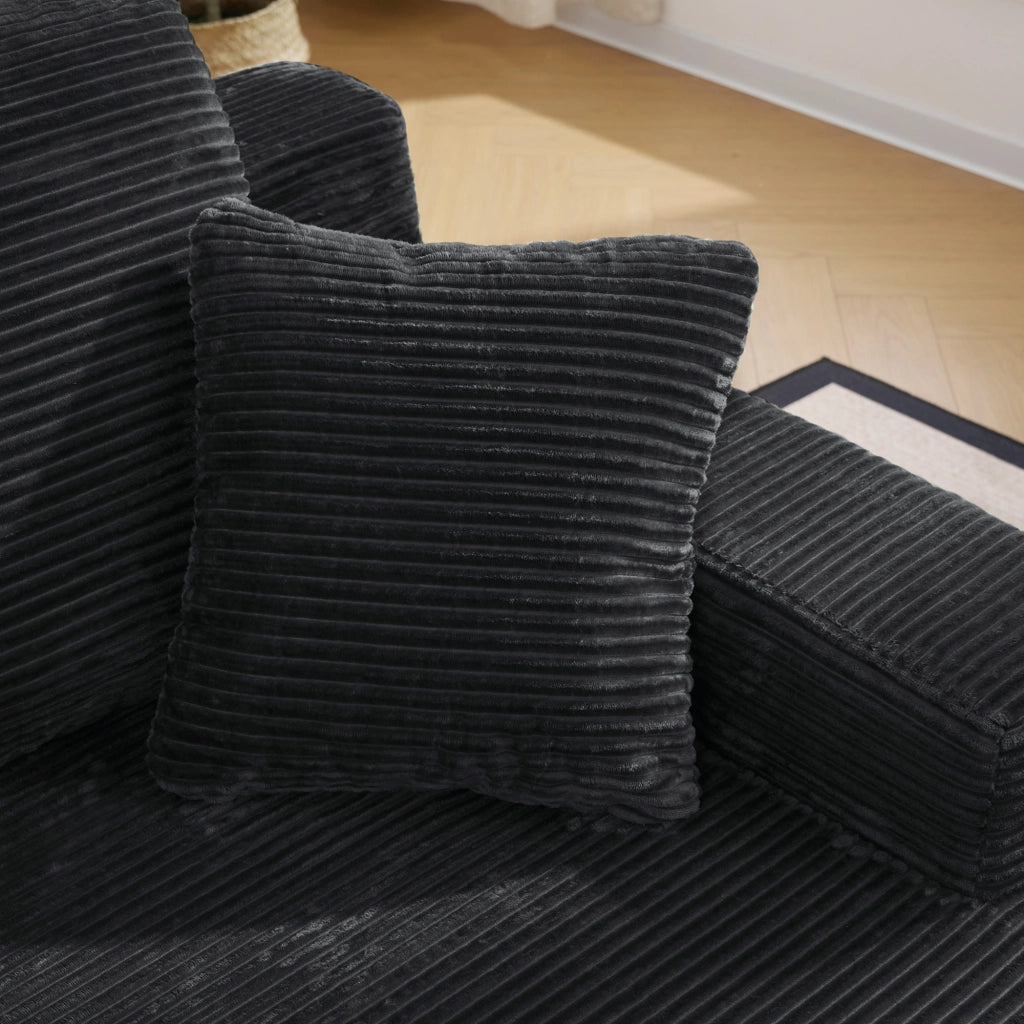 DIVANO in corduroy nero con tasche laterali e cuscini