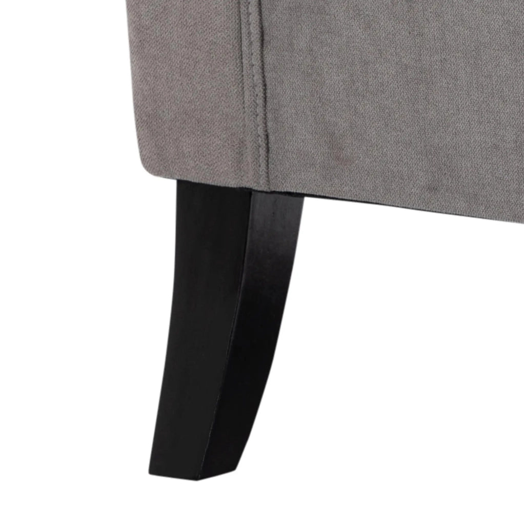 Poltrona orecchioni imbottita grigia con gambe in legno