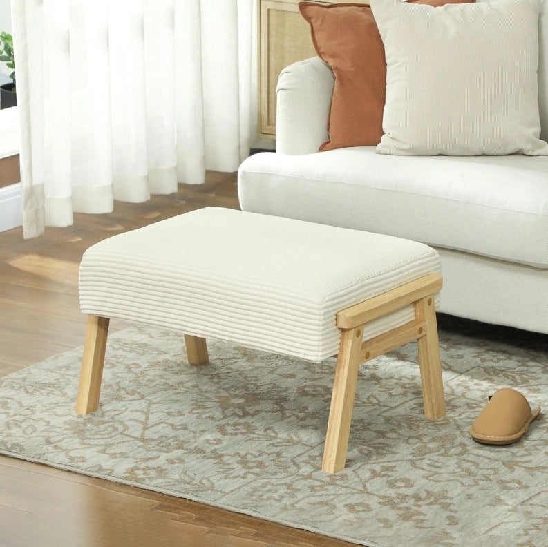 Pouf imbottito crema effetto velluto a coste con gambe in legno