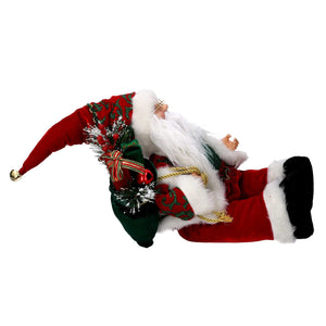 Babbo natale in tessuto bordeaux seduto con musica e movimento cm xh35,5