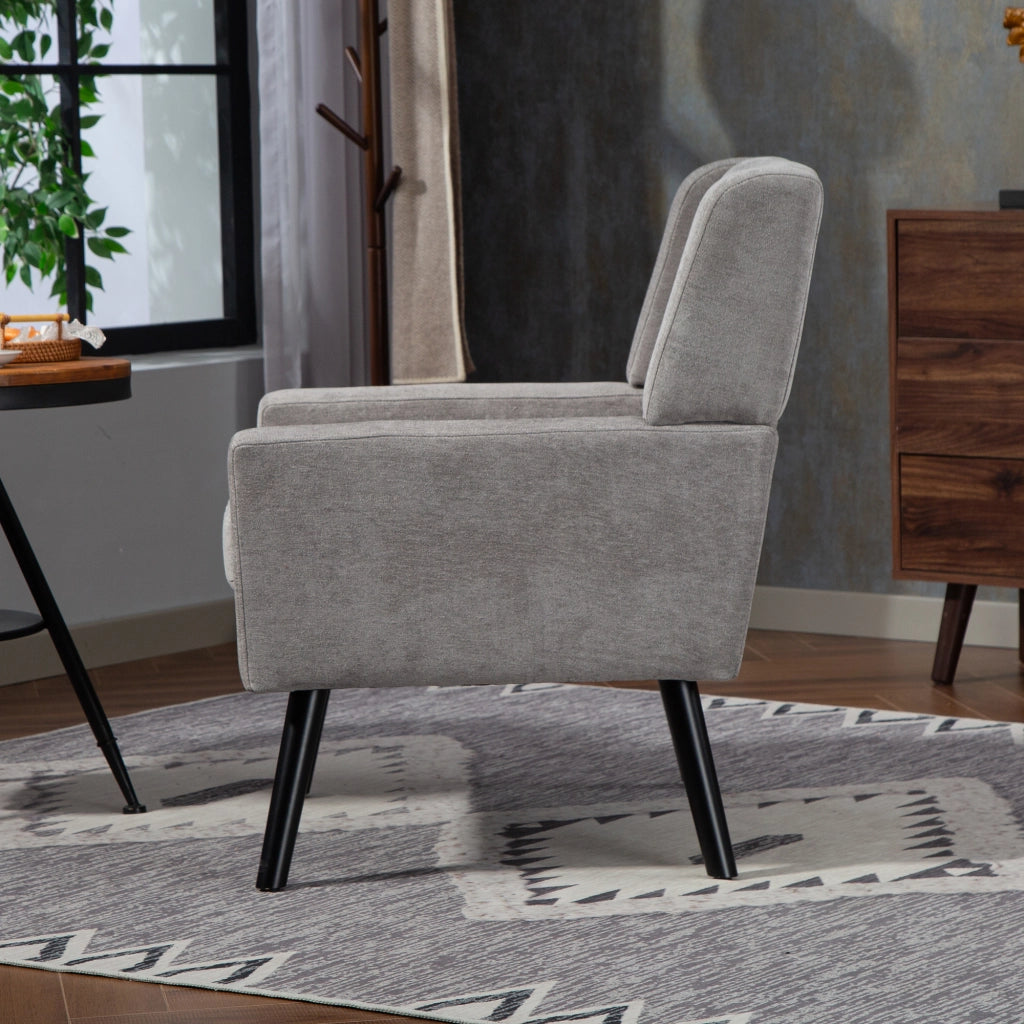 POLTRONA imbottita in lino grigio chiaro con gambe in legno massello