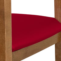 Seggiolone in legno color noce chiaro con seduta imbottita in similpelle rosso
