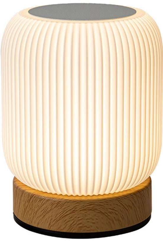 Lampada da notte multifunzionale con regolazione colore RGB, funzione di riduzione luminosità e interfacce touch.
