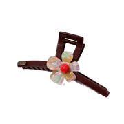 Fermaglio a forma di squalo con fiore iridescente Ankola Red Claw da donna