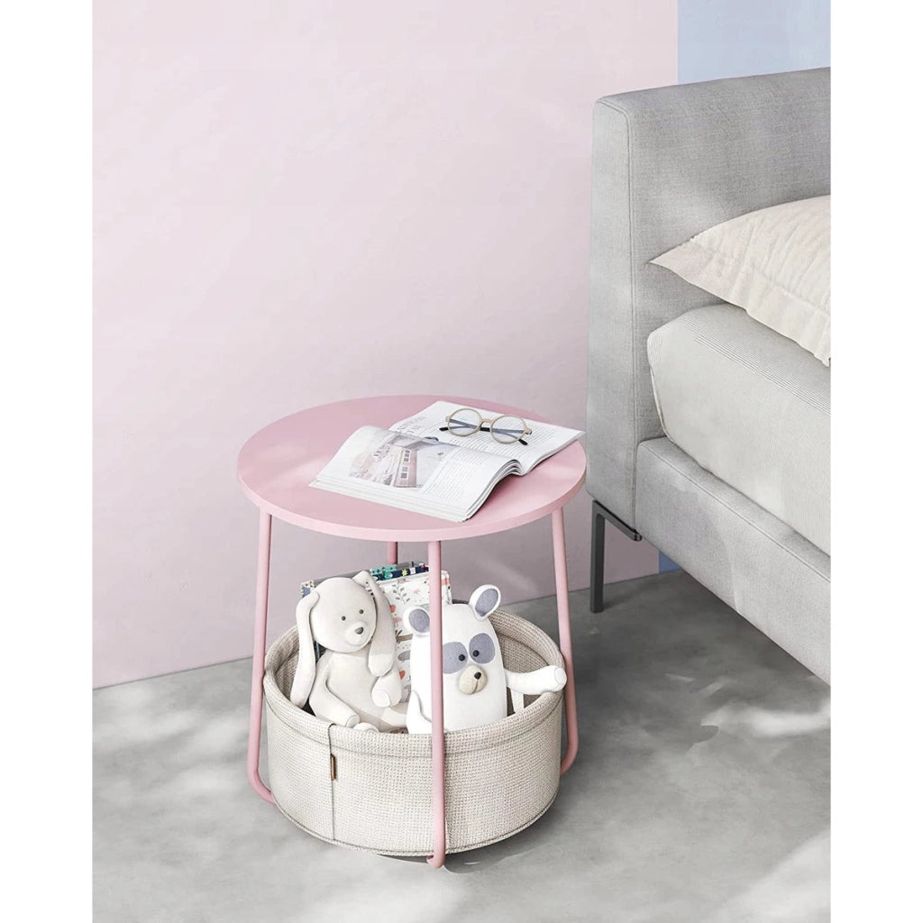 Tavolino rotondo moderno rosa pastello con cesto portaoggetti