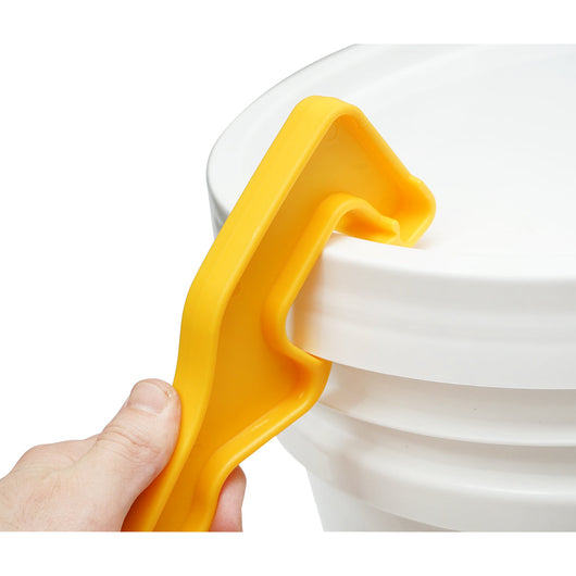Utensile per aprire il secchio di miele in plastica