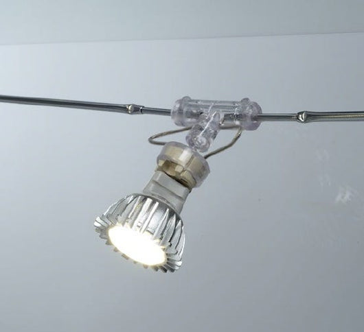 Illuminazione LED con faretti regolabili per SINGOLO lato per 4 piani