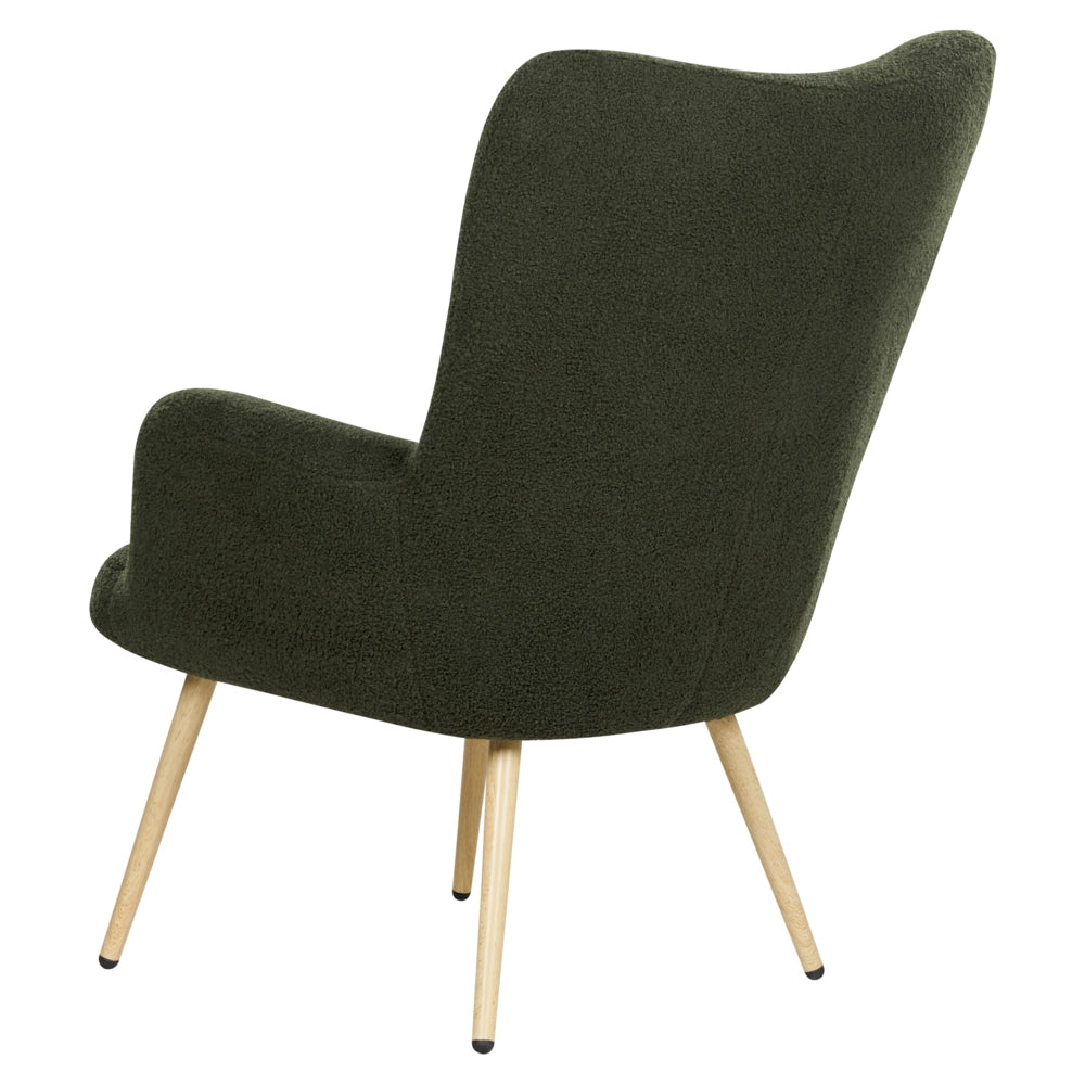Poltrona rivestita in tessuto verde scuro con motivo floreale con poggiapiedi in stile retrò