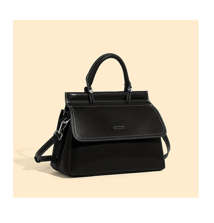 Borsa a mano da donna in vera pelle, colore nero.
