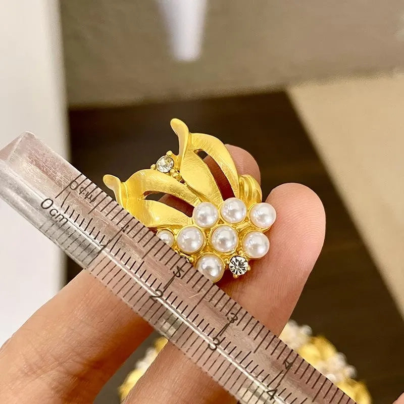 Set di gioielli vintage fatti a mano con perle di grano dorate: collana, bracciale e orecchini