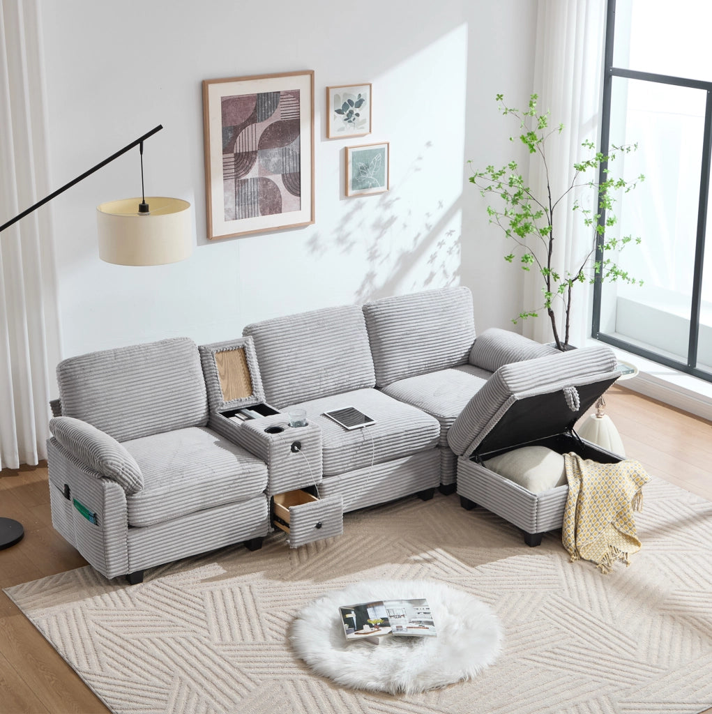 Divano modulare in corduroy grigio chiaro con memory foam; USB-C e pouf contenitore 266 cm