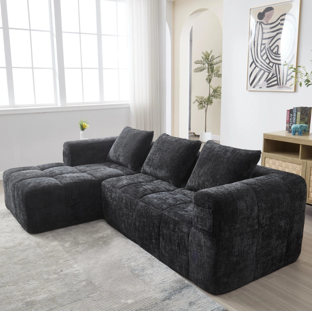 Divano angolare 250x158x60 cm con penisola; tasche laterali e 3 cuscini in chenille nero