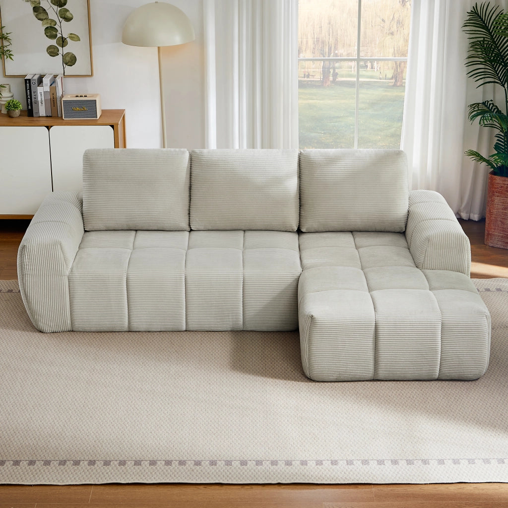 Divano angolare in velluto a coste con design segmentato e cuscini sfoderabili senza montaggio per soggiorno beige