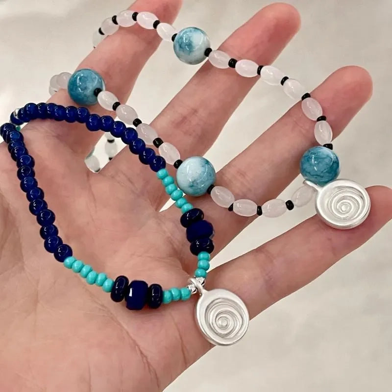 Collana con ciondolo a forma di conchiglia in pietra naturale: gioielli boho con perline