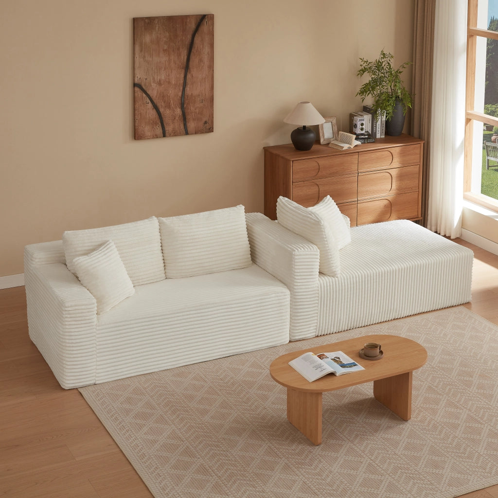 Divano modulare a L con sedute ampie e cuscini sfoderabili in schiuma e molle per salotto bianco 252.5 × 163.0 × 65.0 cm