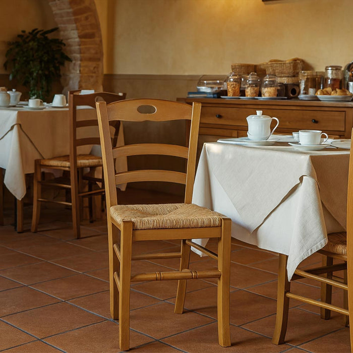 Sedia da pranzo Loris in legno finitura noce chiaro con seduta in paglia