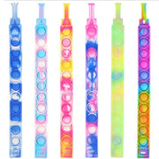 Trade Shop - 6 Braccialetti Antistress Arcobaleno Bolle Aria In Silicone Gioco Bambini Adulti -