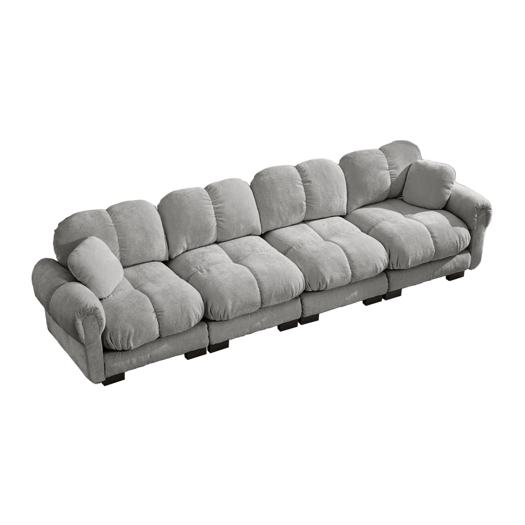 Divano modulare 4 posti con cuciture trapuntate e cuscino lombare in chenille grigio chiaro