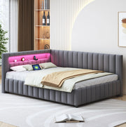Letto imbottito a L 140x200 cm in velluto grigio con LED e porta USB