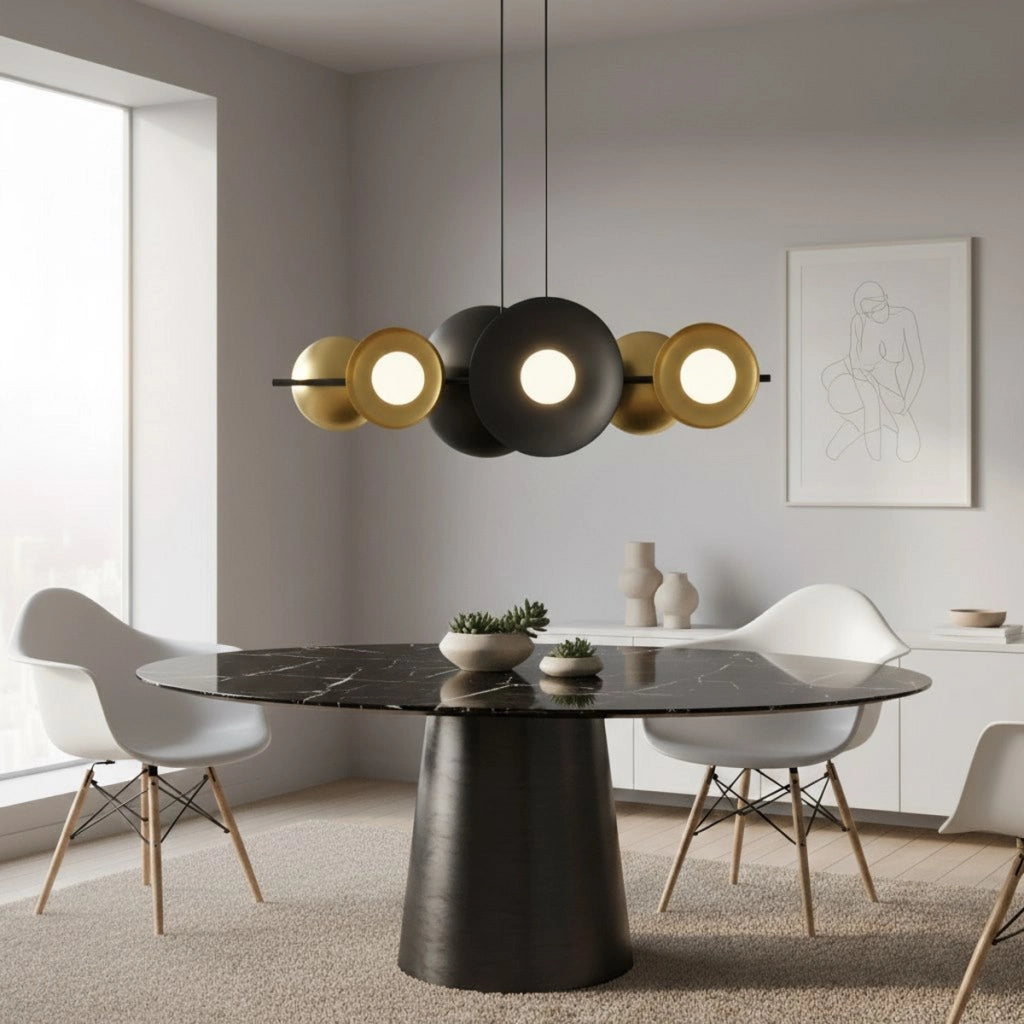 Lampada a sospensione Volum in acciaio nero e oro