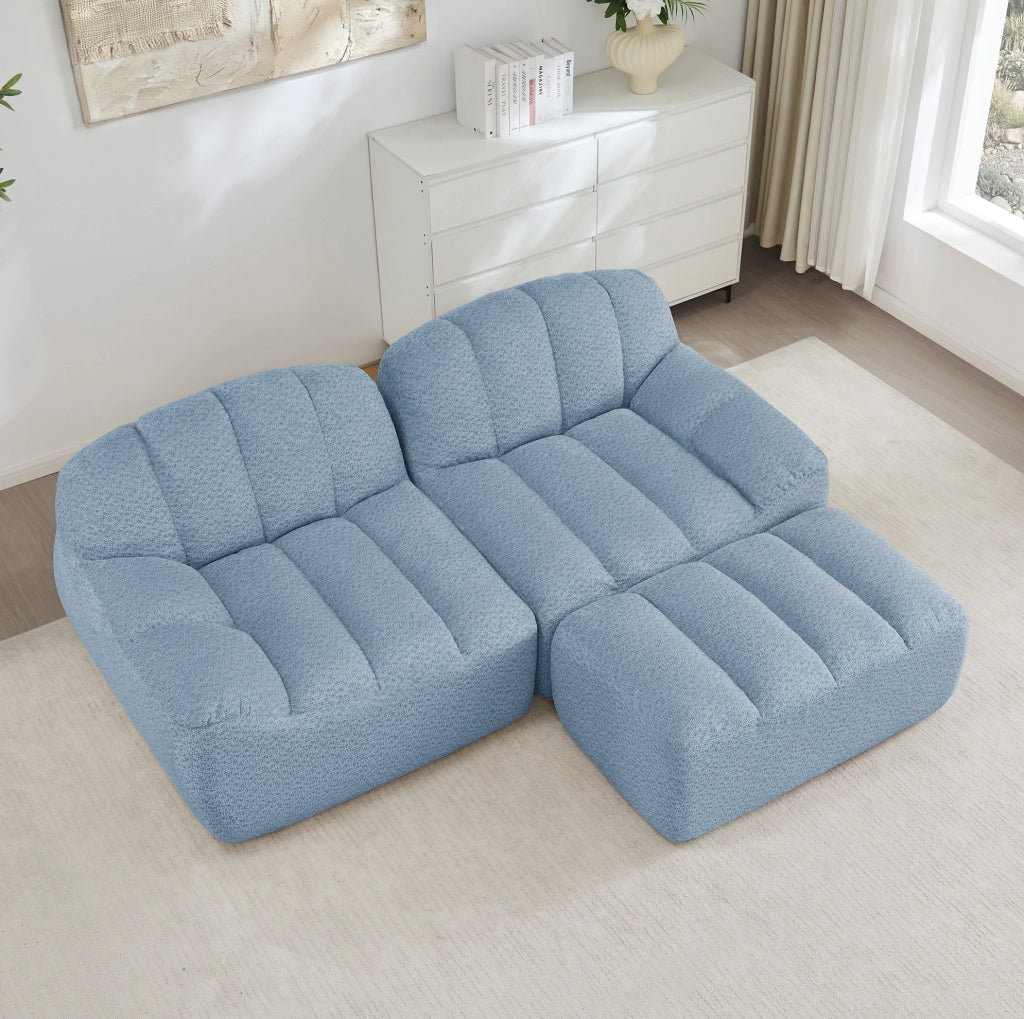 Divano angolare modulare 2 posti con pouf in pile granulato blu HOMVRA