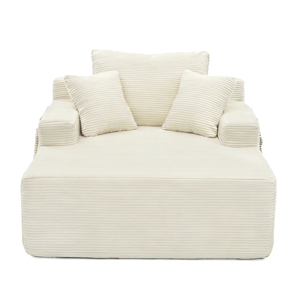 Divano compatto in cord beige con tasche laterali e cuscini