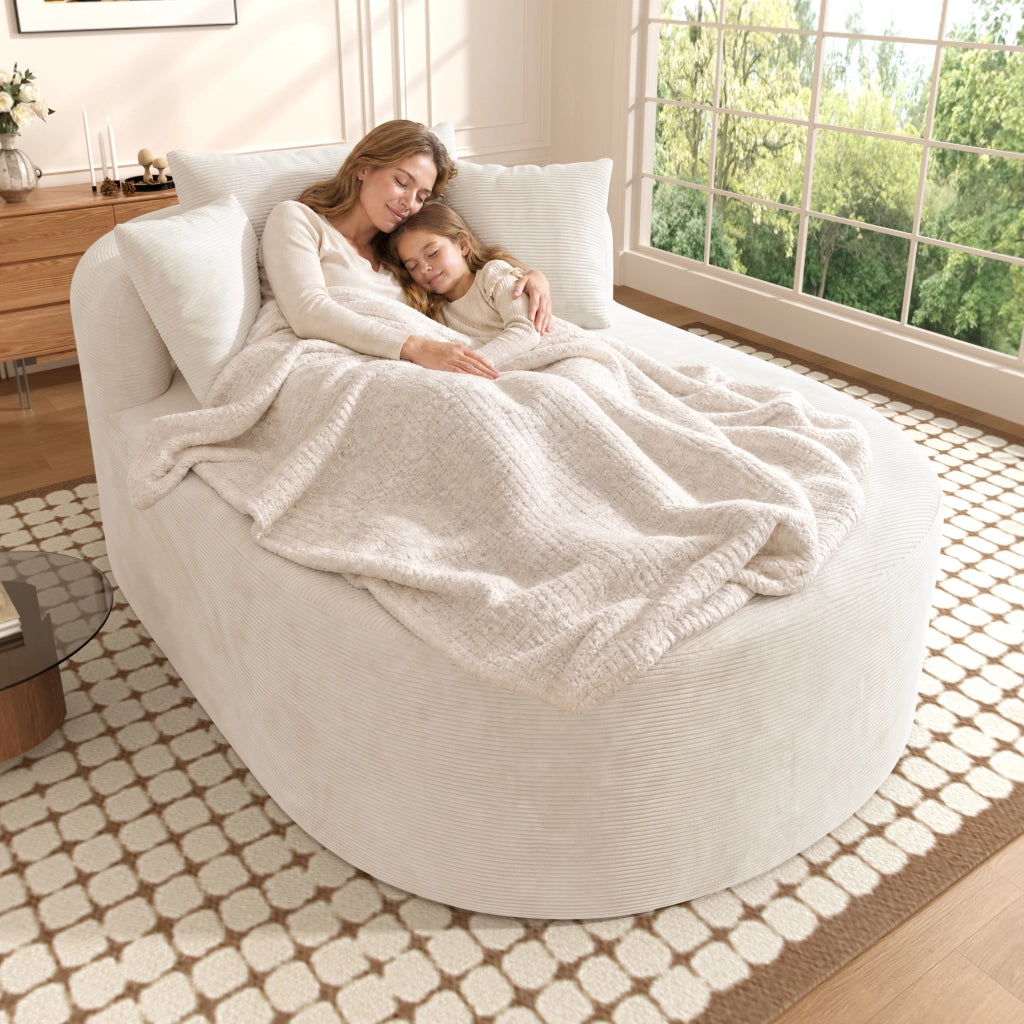 Poltrona relax ovale in tessuto a coste - seduta profonda e forma compatta - beige chiaro