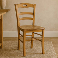 Sedia da sala da pranzo Loris in legno noce chiaro con seduta in massello