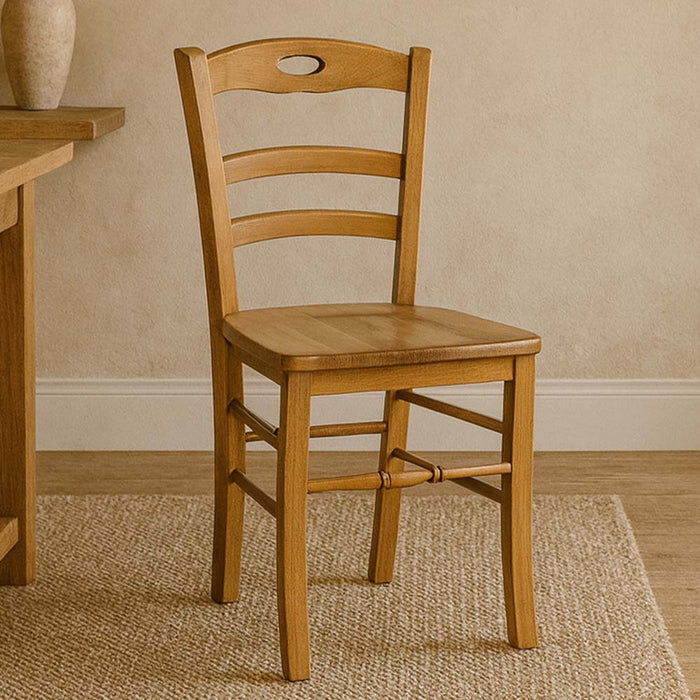 Sedia da sala da pranzo Loris in legno noce chiaro con seduta in massello