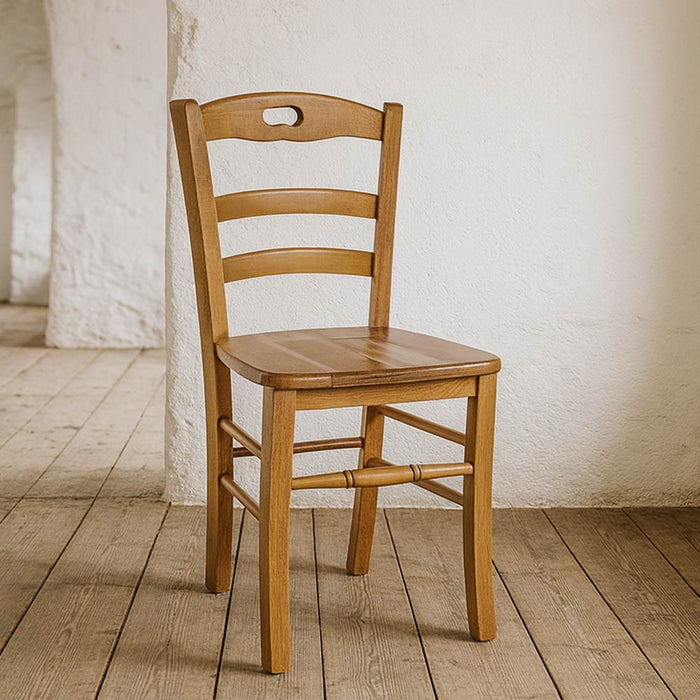 Sedia da sala da pranzo Loris in legno noce chiaro con seduta in massello