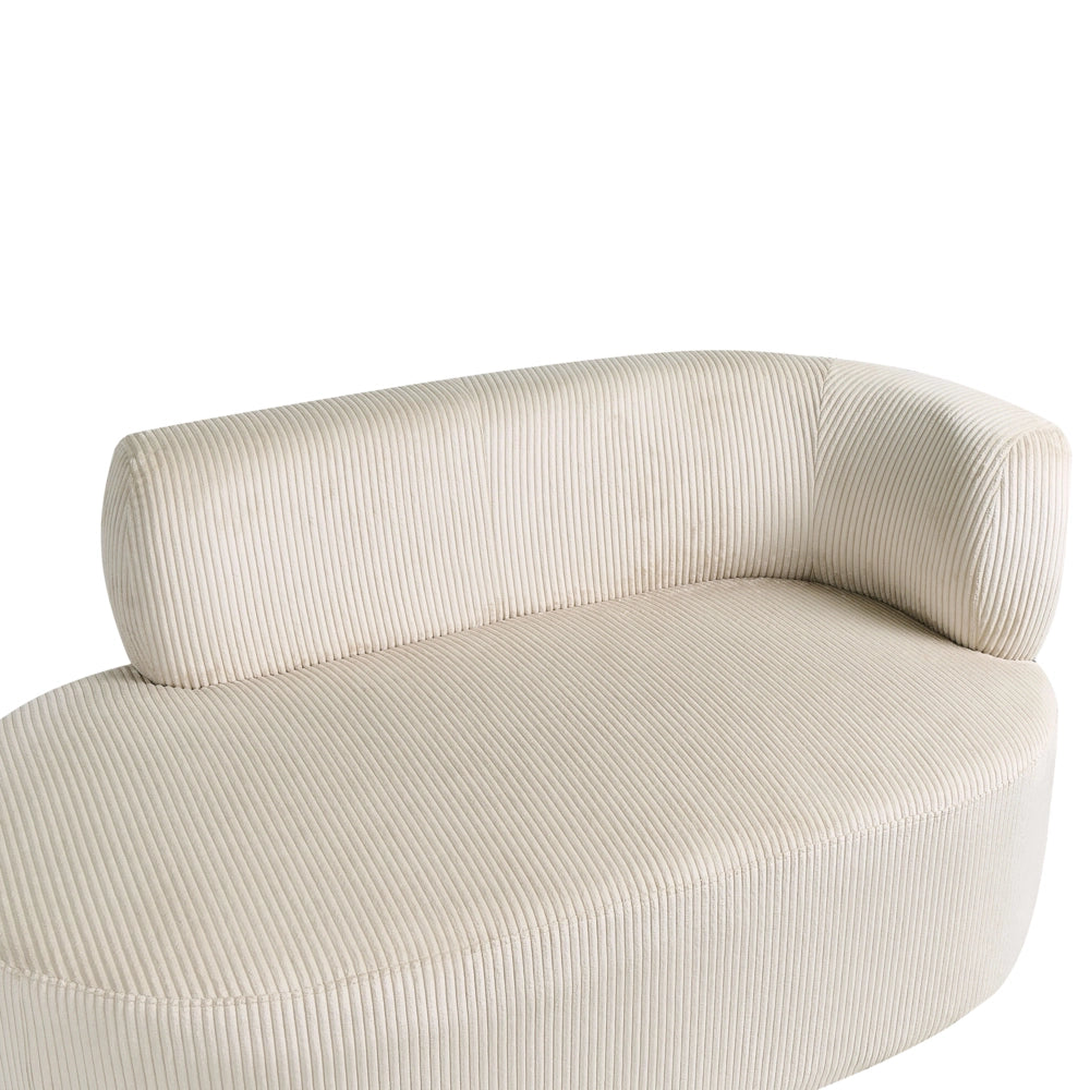 Chaise longue con rivestimento in velluto a coste beige chiaro e cuscino decorativo lato destro