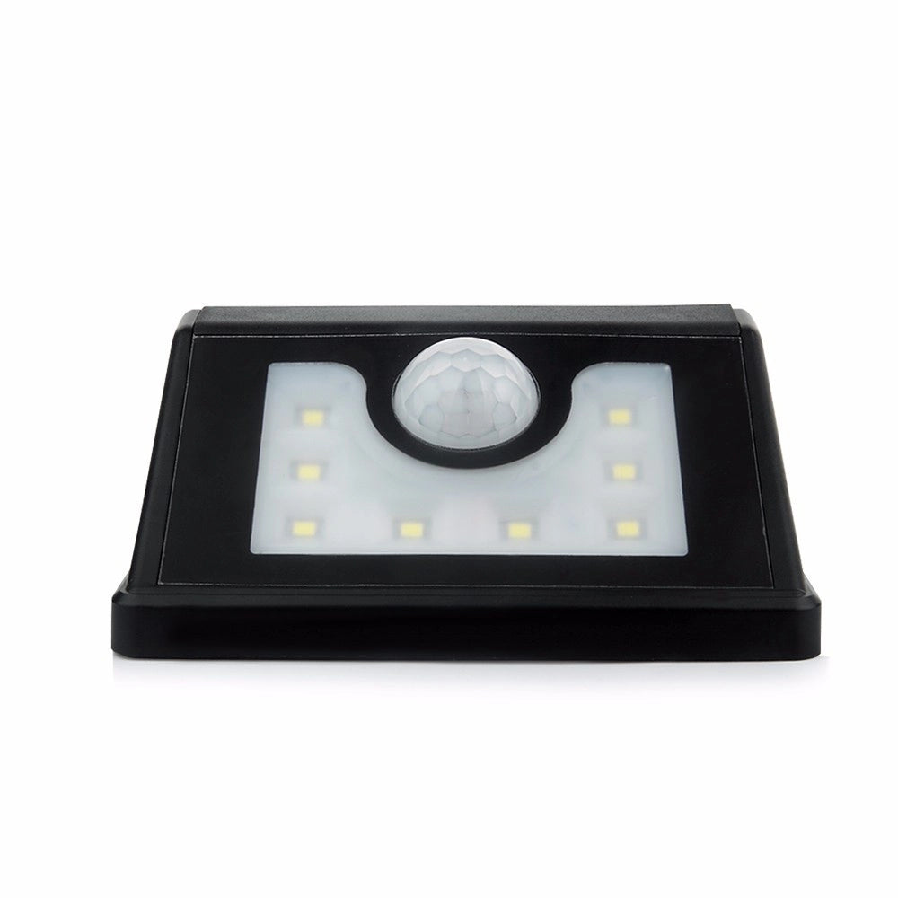 Trade Shop - Faro 8 Led Con Pannello Solare Ricaricabile E Sensore Di Movimento Per Esterno -